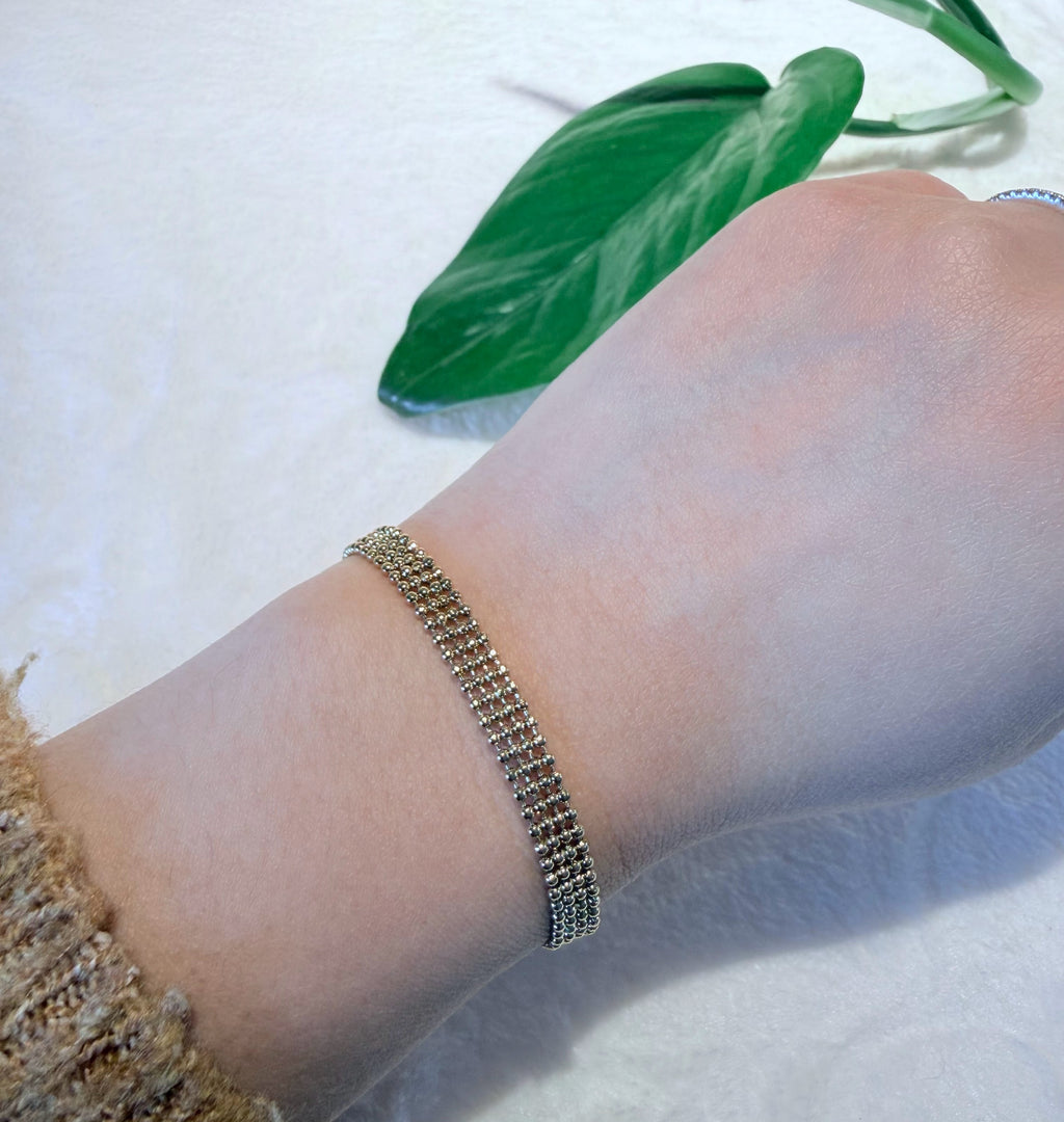 Triple-Row Gold Tone Caviar Bead Bracelet