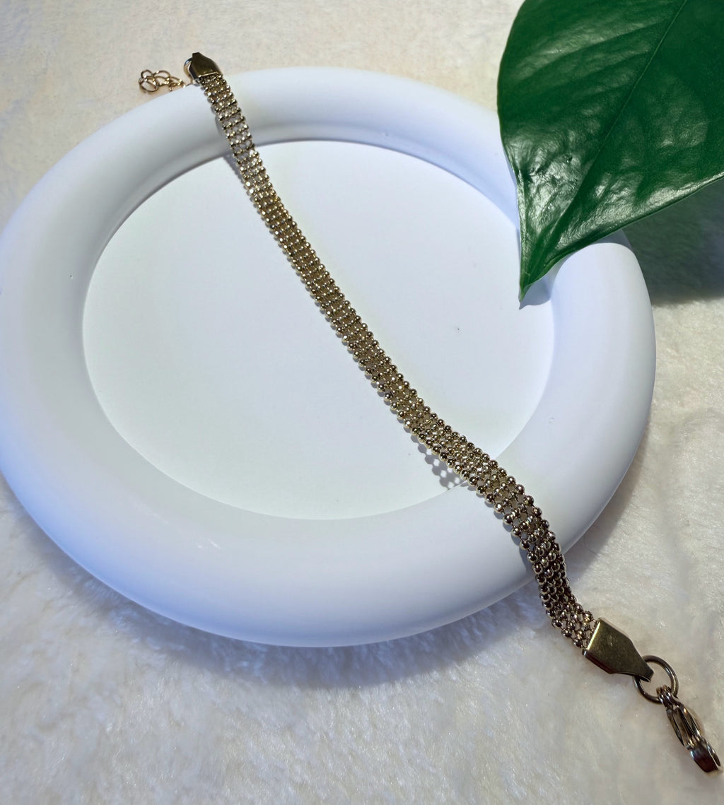 Triple-Row Gold Tone Caviar Bead Bracelet