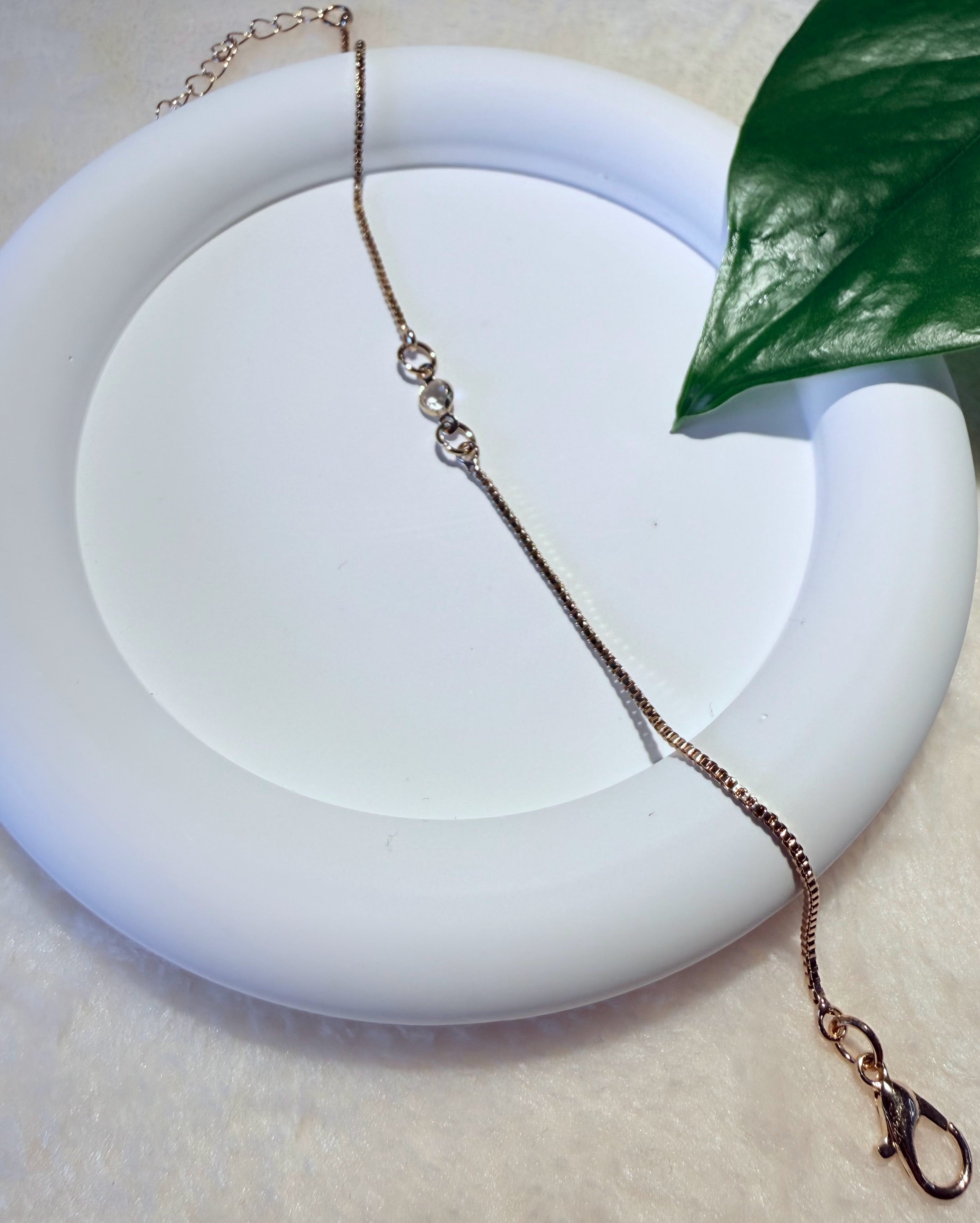 Dainty Gold-Tone Crystal Orbit Bracelet